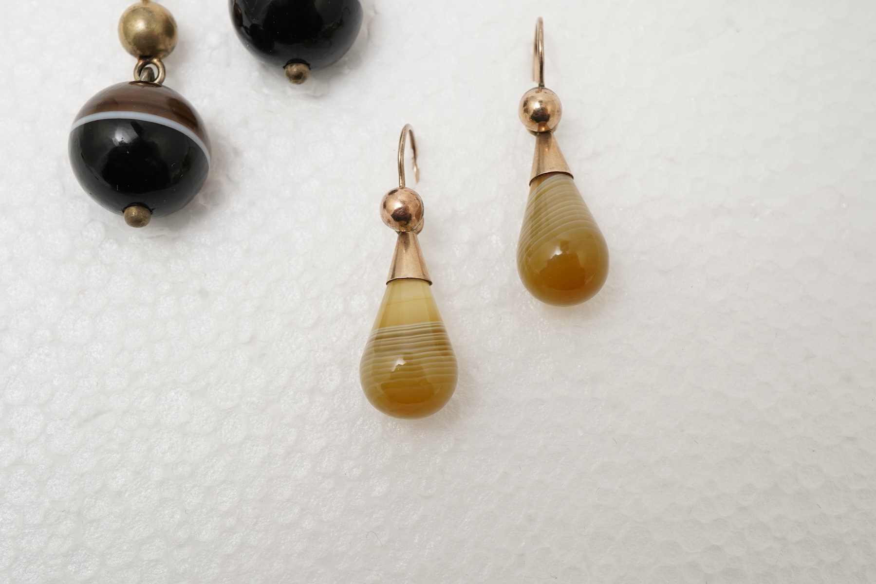 Three pairs of agate earrings, late 19th century